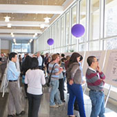 People browsing a poster fair.